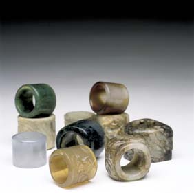 Appraisal: TEN JADE AND HARDSTONE ARCHER'S RINGS Collection of ten Chinese