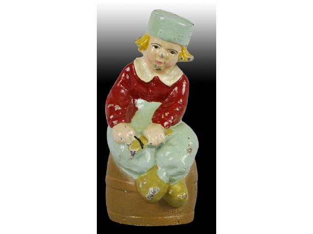 Appraisal: Cast Iron Dutch Boy on Barrel Still Bank Description Made