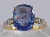 Appraisal: A yellow metal tests carat gold sapphire and diamond ring