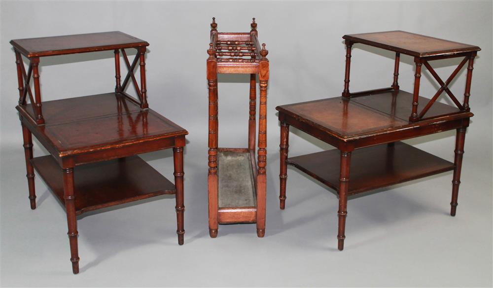 Appraisal: PAIR OF LEATHER-INSET CARVED MAHOGANY MULTI-TIERED OCCASIONAL TABLES WITH A