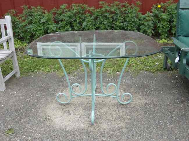 Appraisal: Glass top tubular base patio table