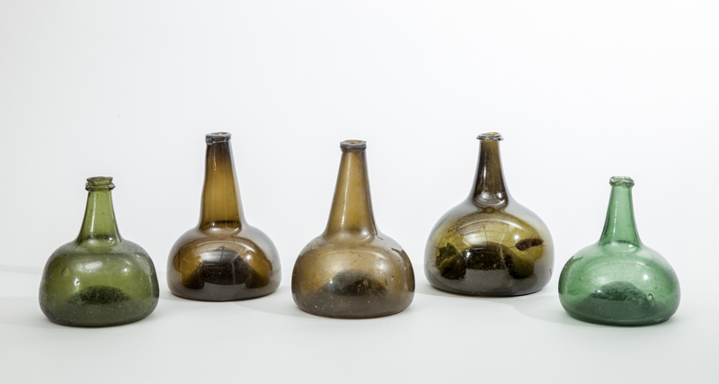 Appraisal: GROUP OF SIX GREEN GLASS MALLET AND BALLOON-SHAPE BOTTLES to