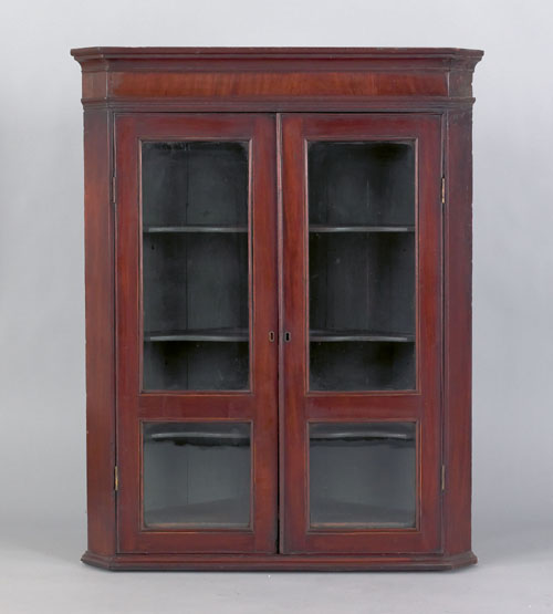 Appraisal: George III mahogany hanging corner cupboard ca h w