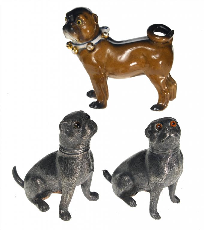 Appraisal: A CONTINENTAL MODEL OF A PUG DOG enamelled and gilt