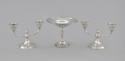 Appraisal: A Pair of Weighted Silver Candlesticks and a Weighted Silver