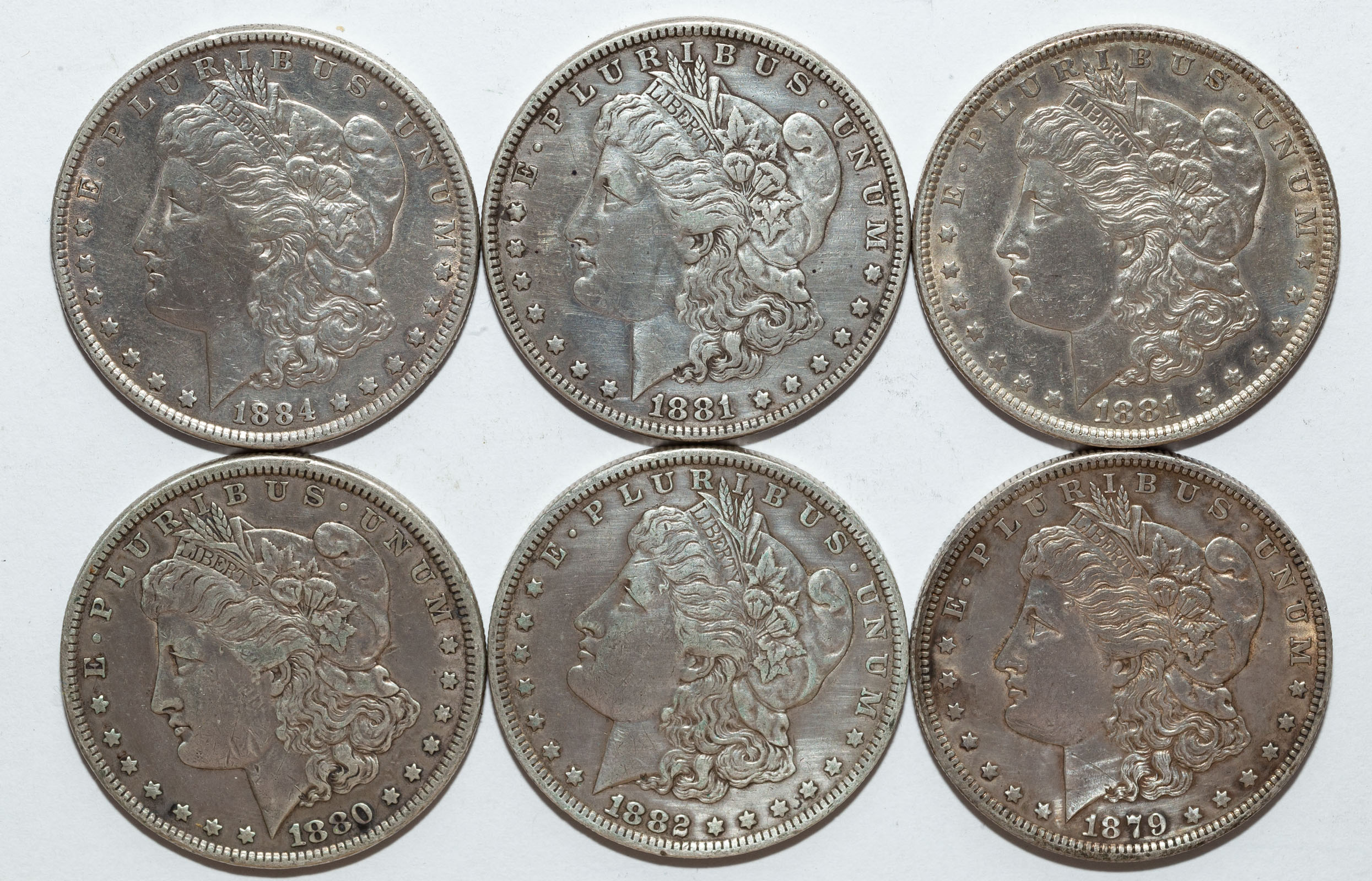 Appraisal: SIX SILVER MORGAN DOLLARS -O XF Obv Cleaned VF Cleaned