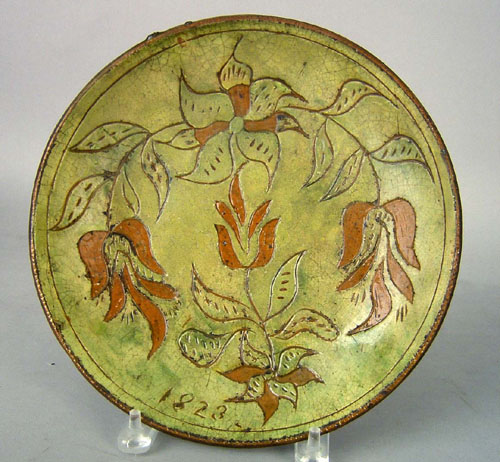 Appraisal: Southeastern Pennsylvania sgraffito decorated redware plate dated with tulip and