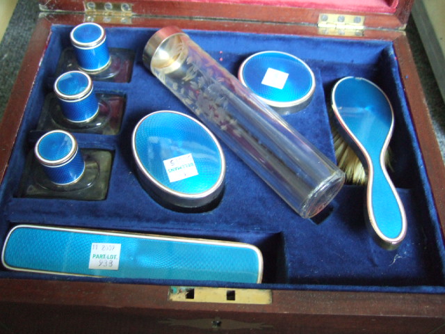 Appraisal: A French silver and blue enamel mounted toilet set comprising