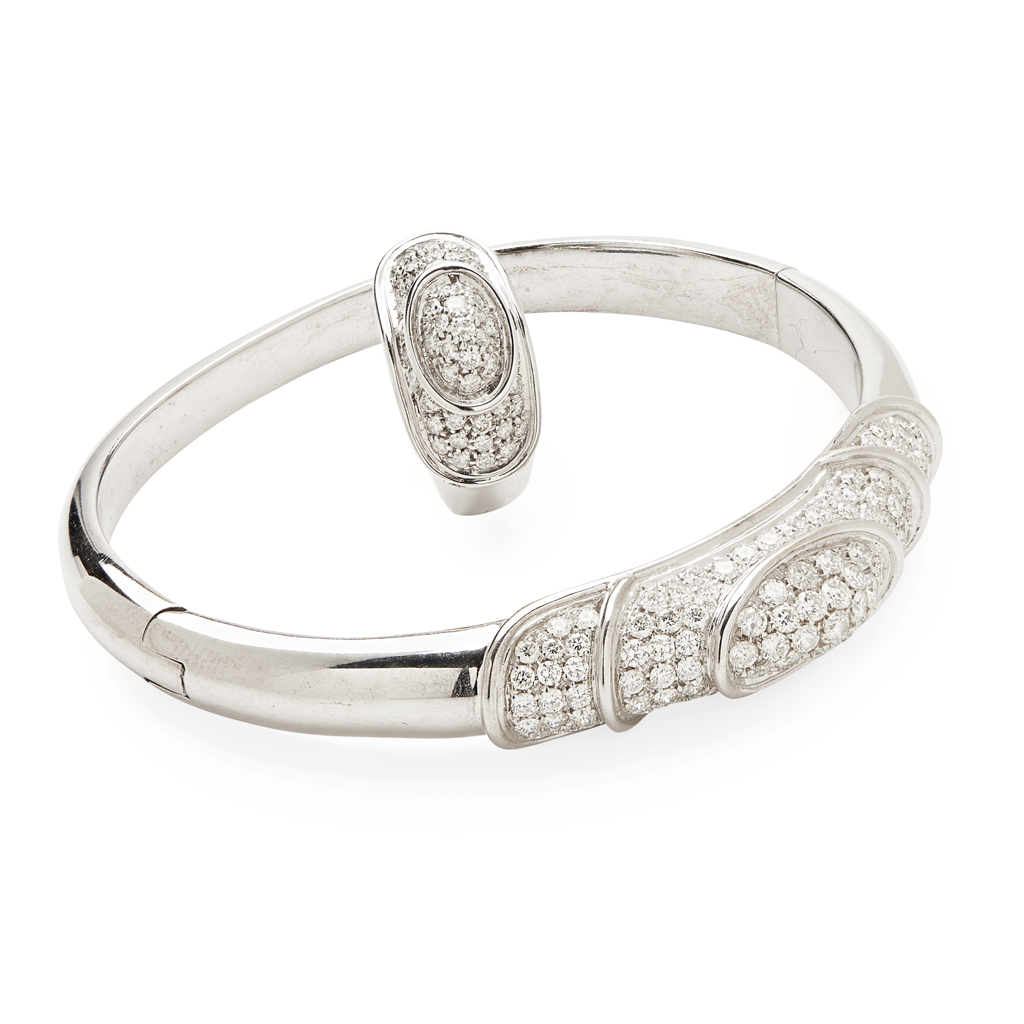 Appraisal: A diamond set bangle and matching ringthe bangle of hinged