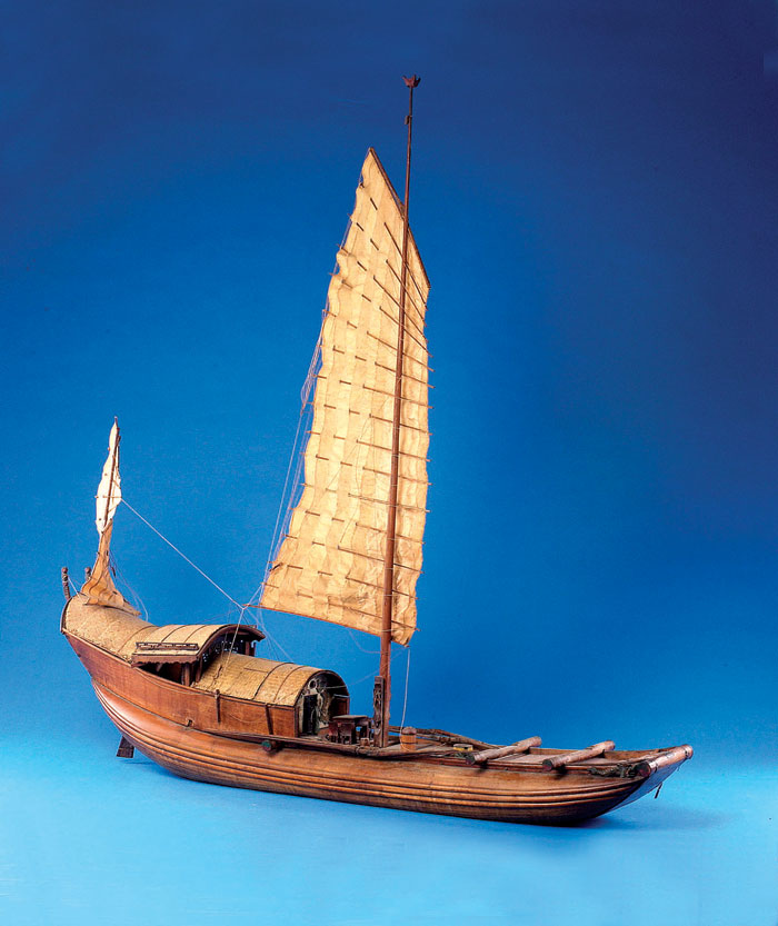 Appraisal: CARVED WOODEN MODEL OF A CHINESE TWO-MASTED JUNK Rendered in