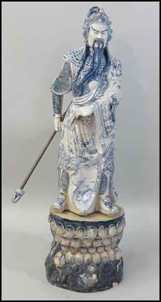 Appraisal: BLUE AND WHITE PORCELAIN WARRIOR FIGURE On a porcelain base