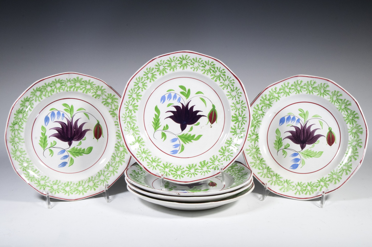 Appraisal: COLUMBINE PATTERN STICK SPATTER PLATES BY HARVEY Set of th