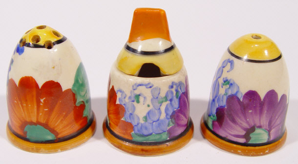 Appraisal: Clarice Cliff Bizarre three piece cruet set hand painted with