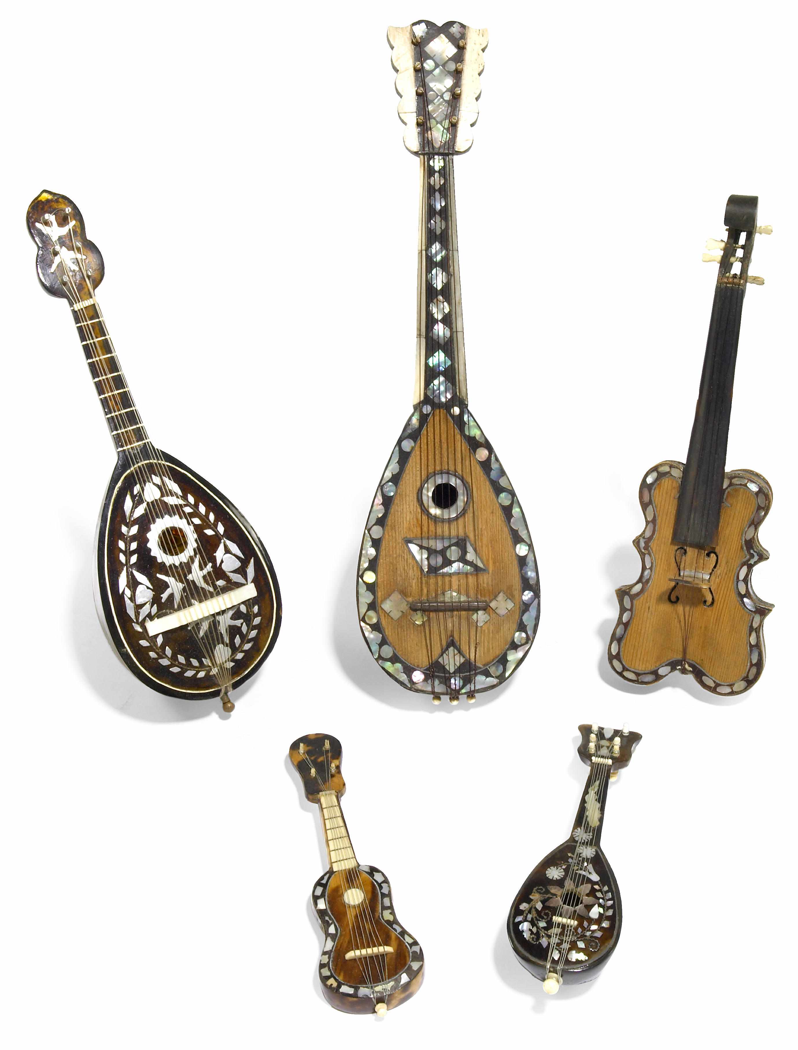 Appraisal: A group of five tortoiseshell and shell inlaid miniature musical