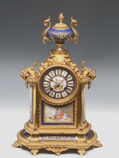 Appraisal: A TH CENTURY FRENCH MANTEL CLOCK with polychrome ceramic Roman