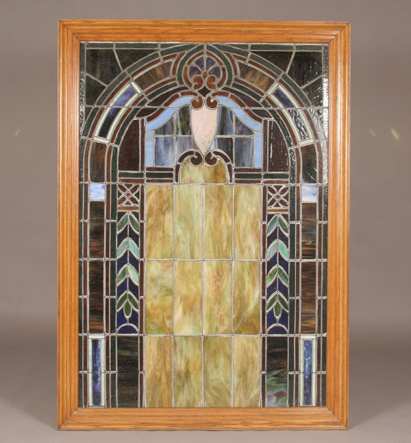 Appraisal: Large framed stained slag glass window arched panels floral geometric