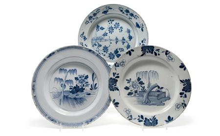 Appraisal: Two English Delft Blue and White Chargers Together with a