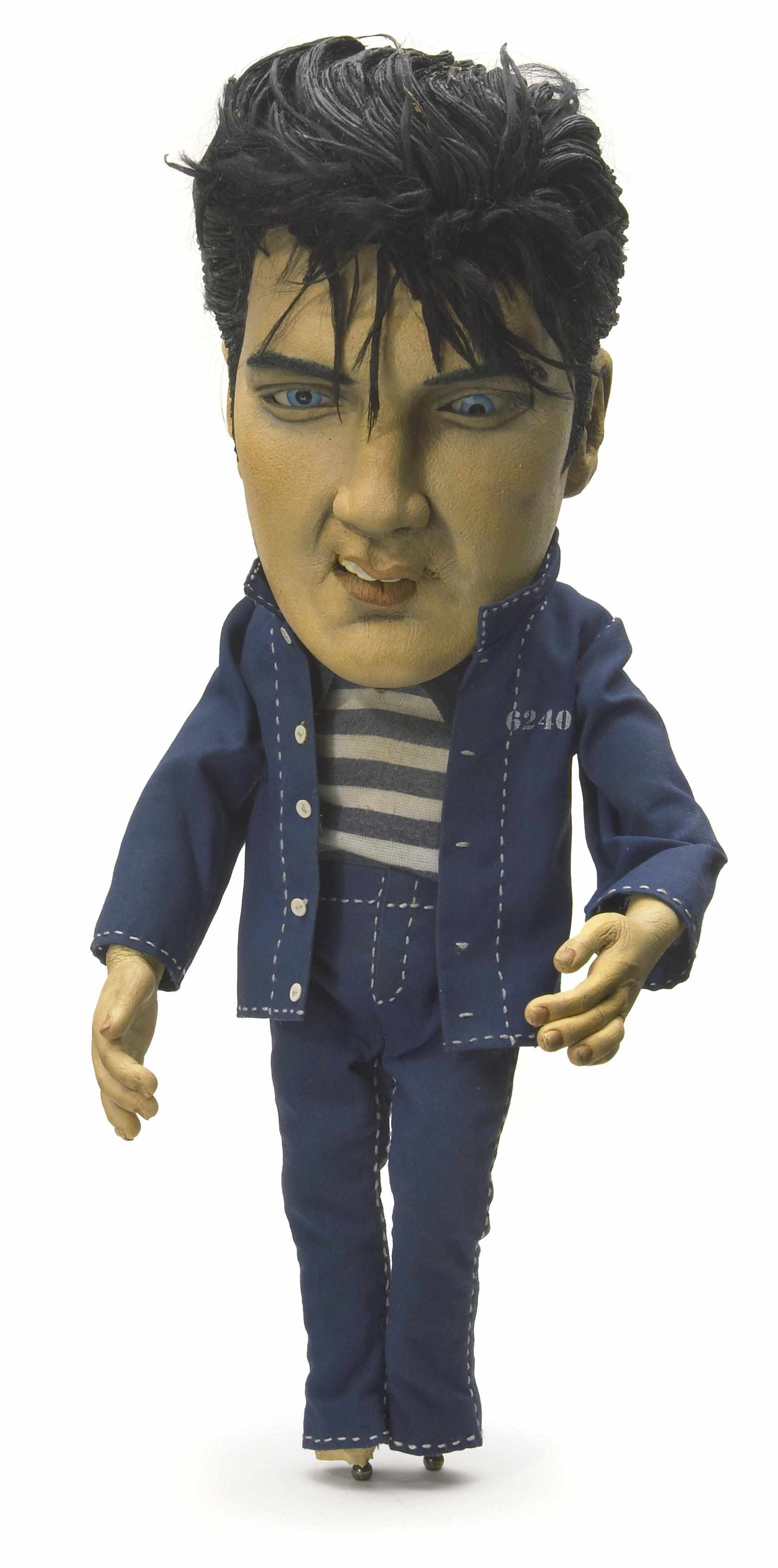 Appraisal: Elvis Presley commercial puppet A fully articulated painted foam over