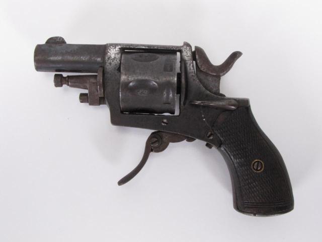 Appraisal: European folding trigger cal revolver cylinder marked with proof marks