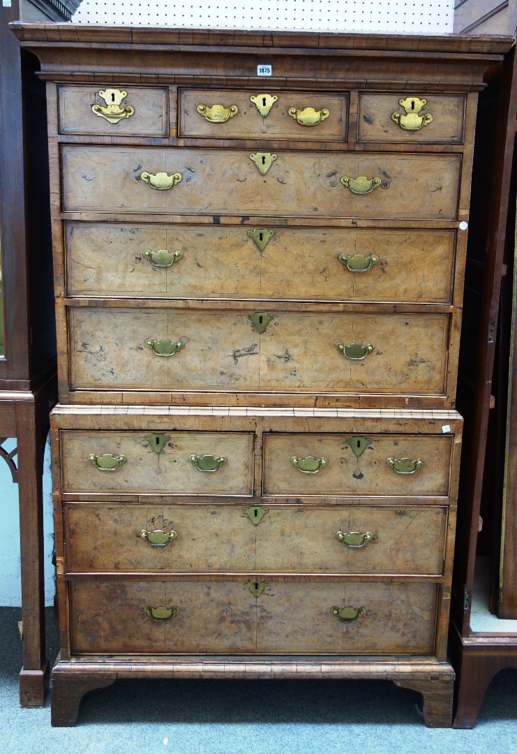 Appraisal: An th century walnut chest on chest of three short