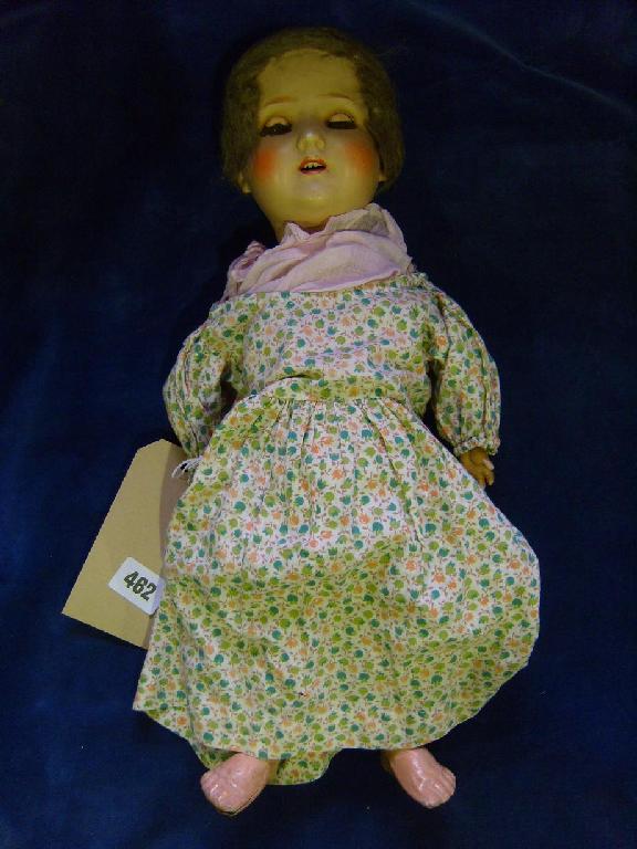 Appraisal: A German Schoenau and Hoffmister bisque headed doll with closing