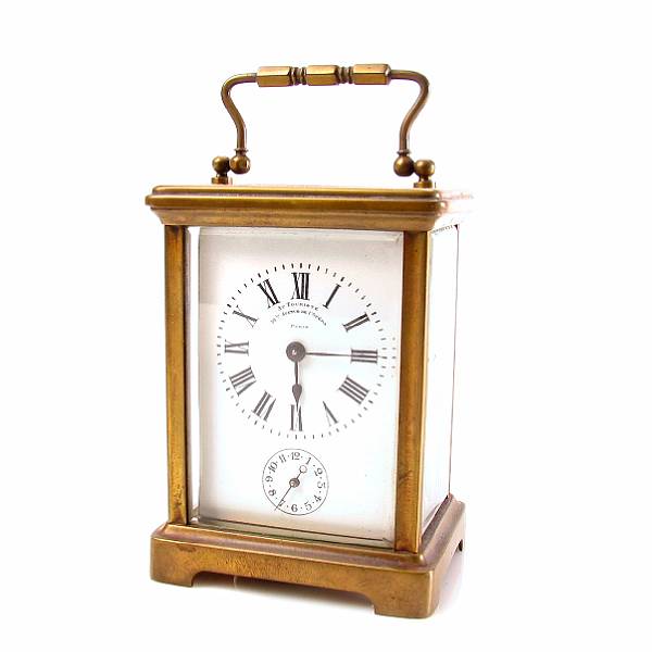 Appraisal: A French gilt brass carriage timepiece in a corniche case