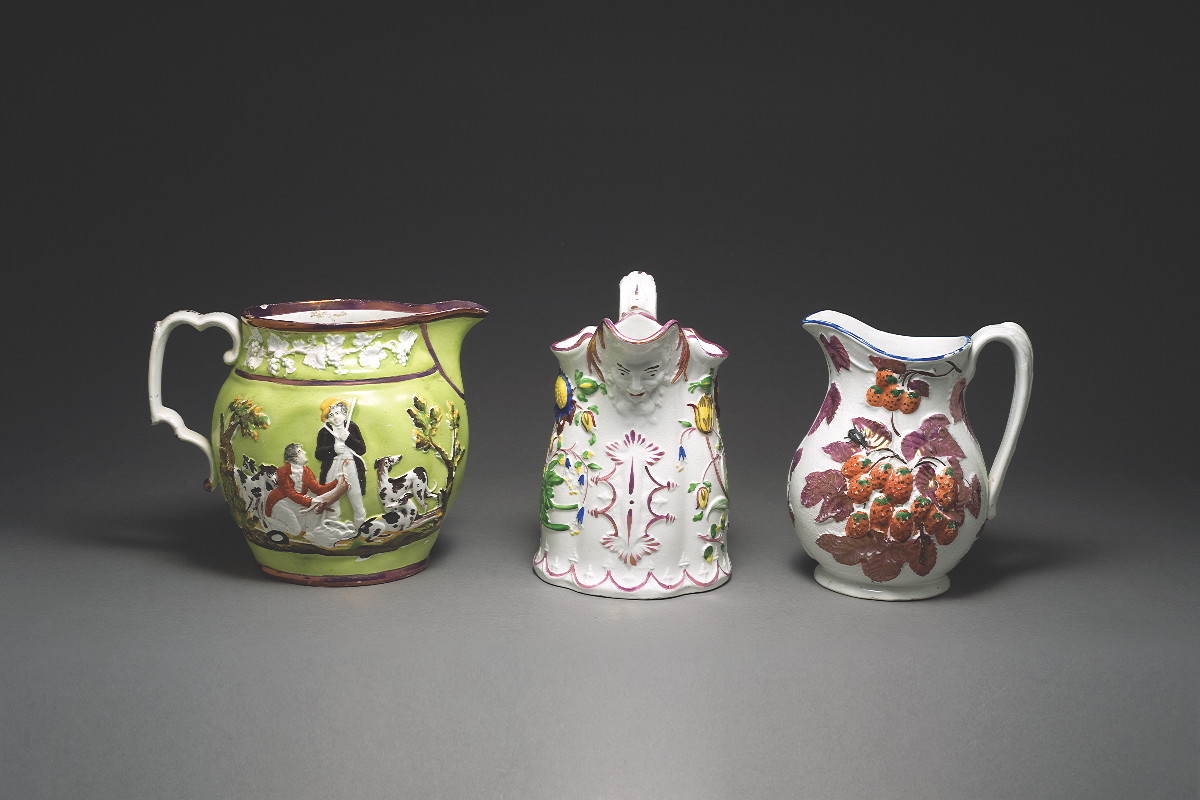 Appraisal: TWO STAFFORDSHIRE ENAMEL AND PINK LUSTRE-DECORATED JUGS CIRCA - The