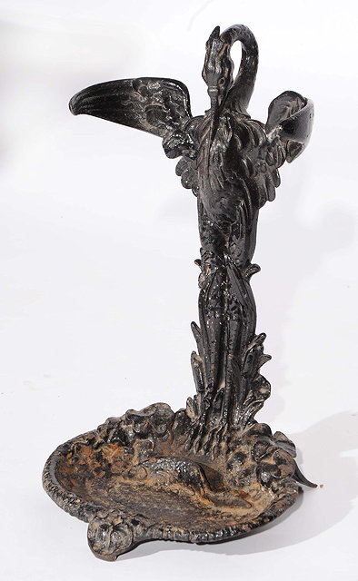 Appraisal: A VICTORIAN CAST IRON STICK STAND in the form of