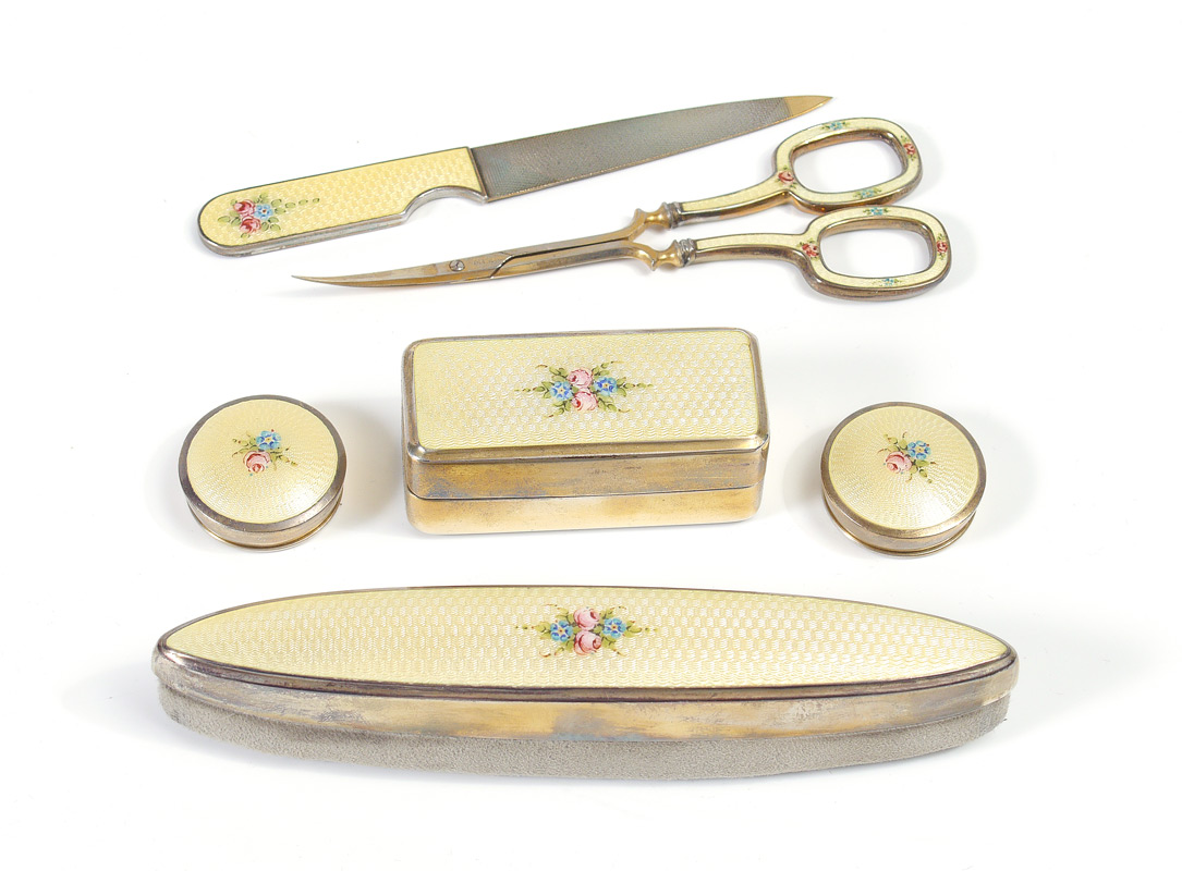 Appraisal: 'S GUILLOCHE ENAMELED MANICURE SET piece with ivory colored and