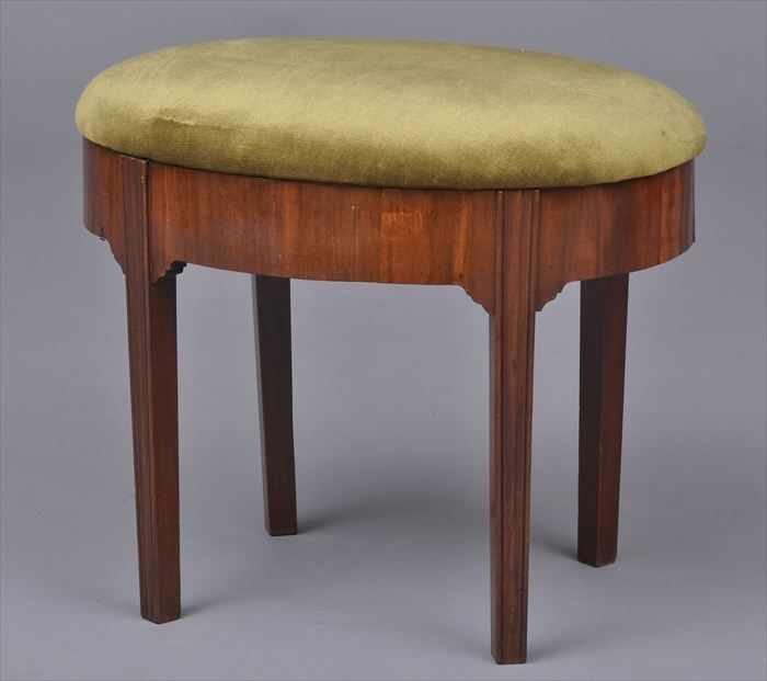 Appraisal: GEORGE III-STYLE MAHOGANY STOOL The oval padded and hinged seat