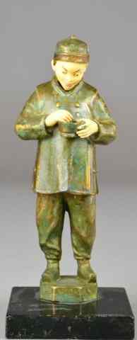 Appraisal: Chinese Cultural Revolution FigurePolychrome painted figure of boy with rice