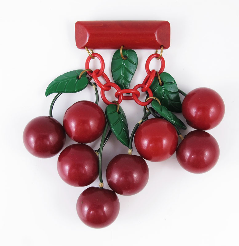 Appraisal: BAKELITE RED CHERRY BROOCH Bar pin with cherries ''w x