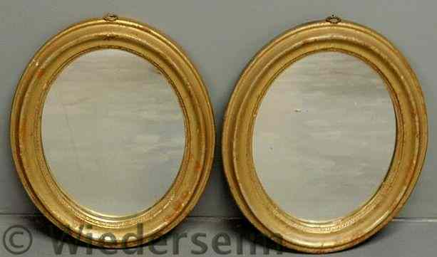 Appraisal: Small pair of oval gilt decorated mirrors x