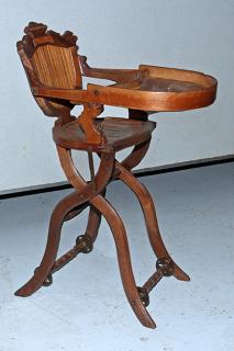 Appraisal: Victorian high chair fine original condition with deep hewn walnut