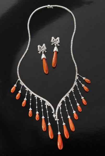 Appraisal: K gold coral and diamond necklace and earrings the necklace