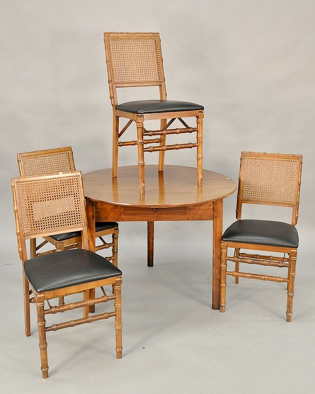 Appraisal: Mahogany folding table set including four faux with bamboo chairs