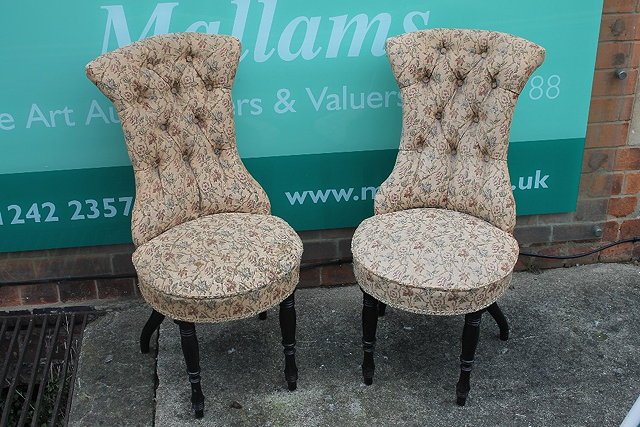 Appraisal: A PAIR OF TH CENTURY SALON CHAIRS with upholstered button