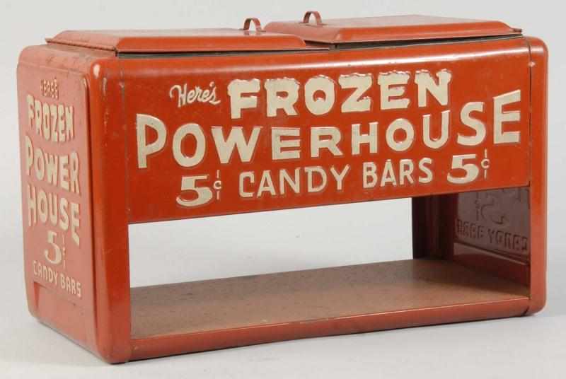 Appraisal: Metal Frozen Powerhouse Candy Bar Dispenser Description Nice example overall