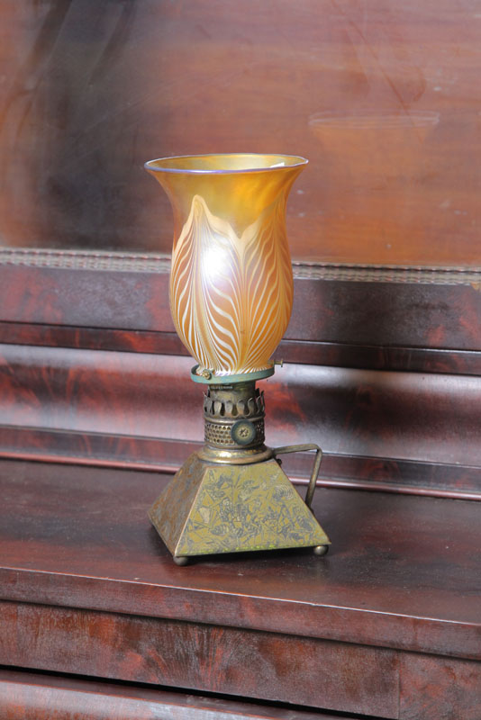 Appraisal: SMALL OIL LAMP Brass of pyramid form with geometric design