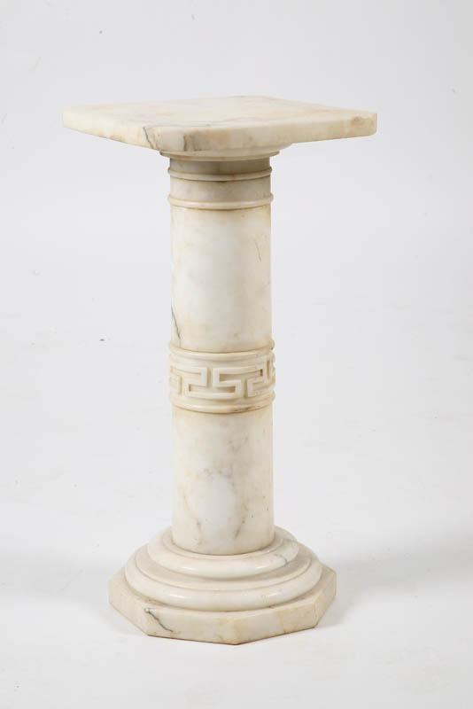 Appraisal: WHITE MARBLE PEDESTAL Square top with canted corners on a