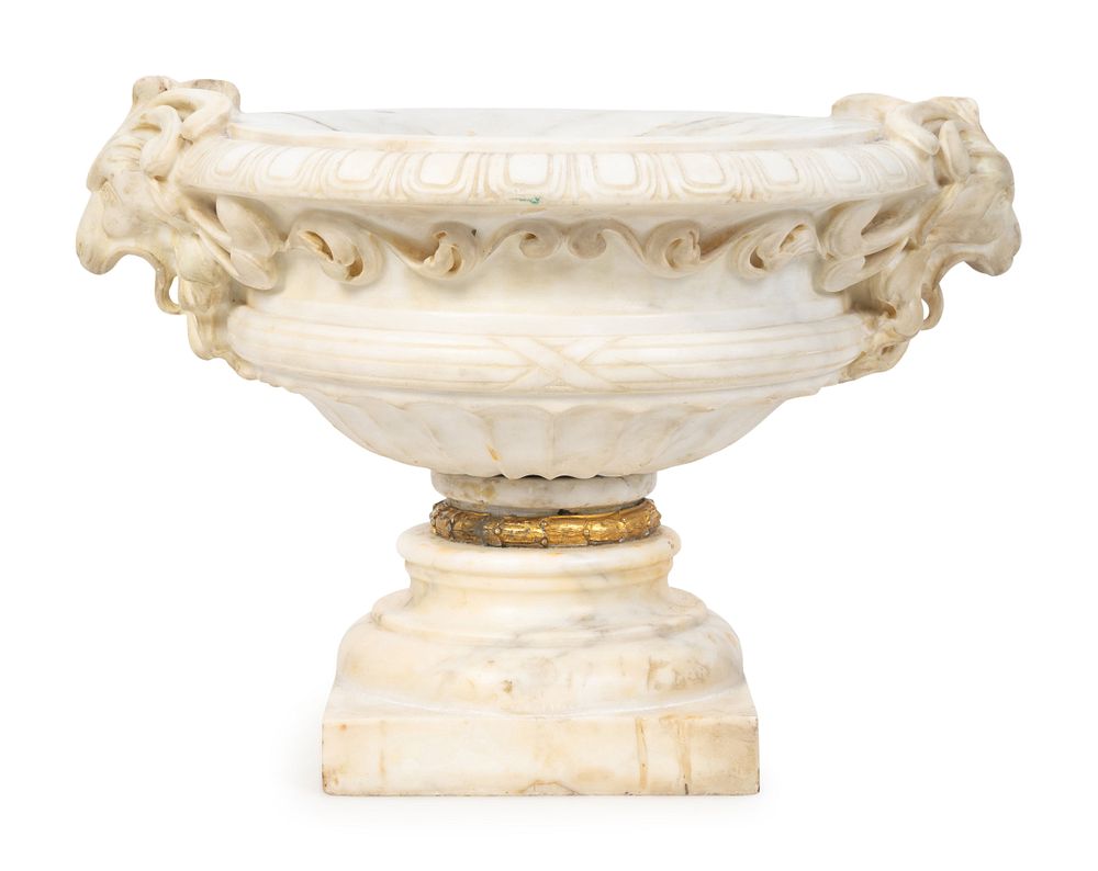 Appraisal: A Neoclassical Style Carved Marble Urn Height x length over