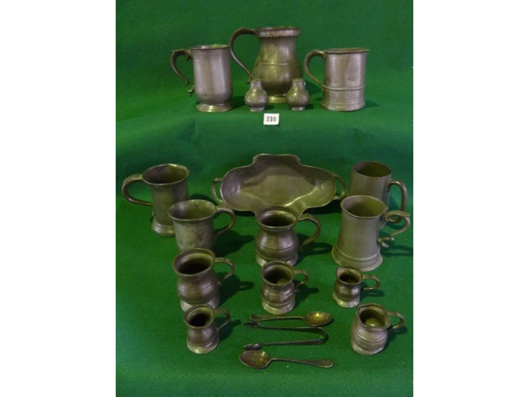 Appraisal: A large quantity of th century pewter mugs peppers gills