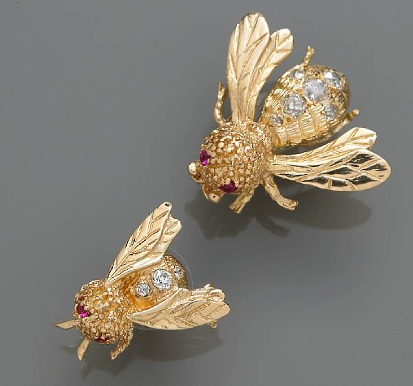 Appraisal: Two diamond and ruby bee motif earrings mounted in fourteen