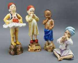 Appraisal: A group of four Royal Worcester figures from the Nations