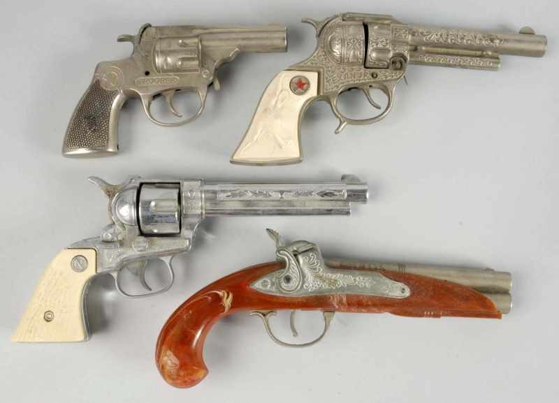 Appraisal: Lot of Cap Pistol Toys Description American Includes one Derringer