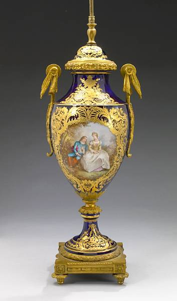 Appraisal: A Sevres style porcelain gilt bronze mounted table lamp late