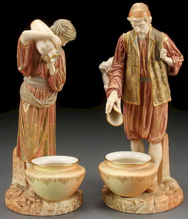 Appraisal: PAIR ROYAL WORCESTER WATER CARRIER FIGURES A GOOD PAIR OF