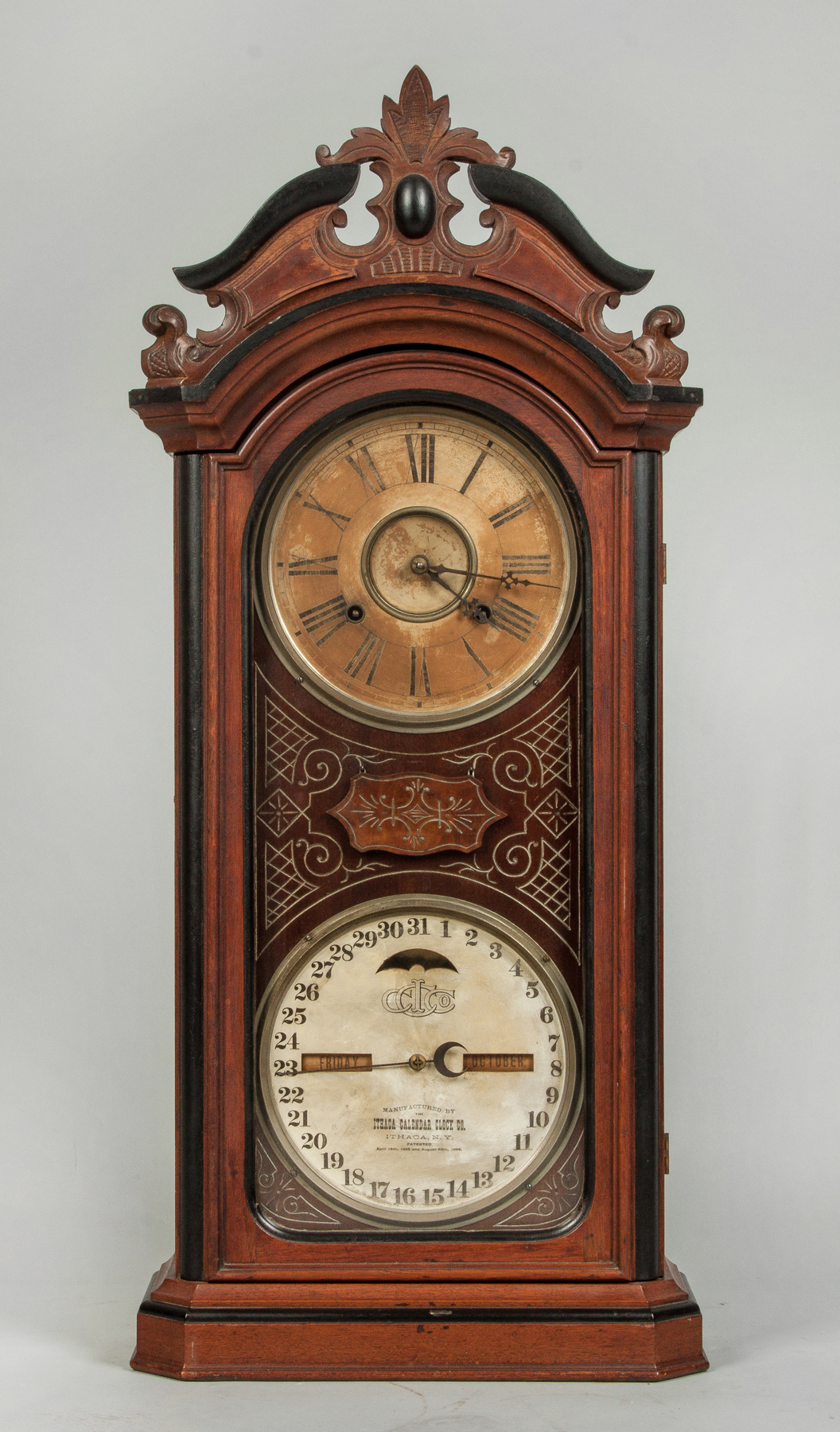 Appraisal: Ithaca Favorite Calendar Clock Carved walnut ebonized case Original paper