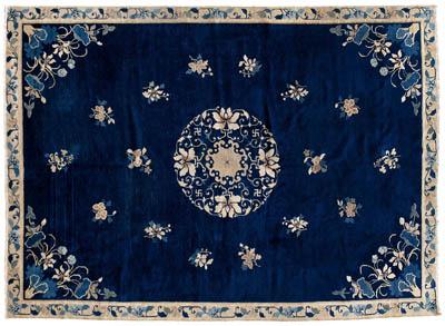 Appraisal: Peking rug circular central medallion on dark blue field scattered