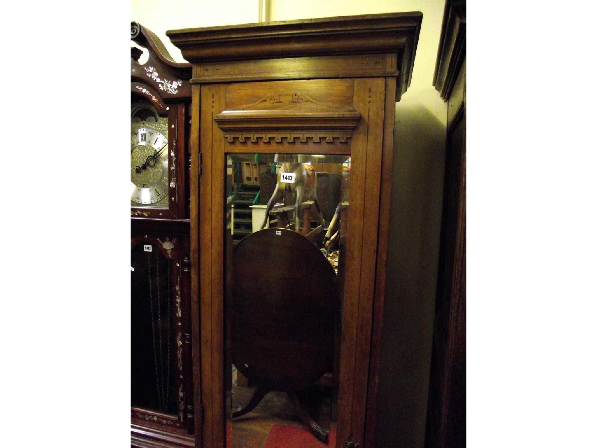 Appraisal: A Victorian ash sentry box hall robe enclosed by a